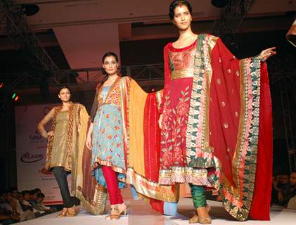 Models walking the ramp at COKUSS Kolkata Fashion File show on Tuesday Evening 4th Aug 09