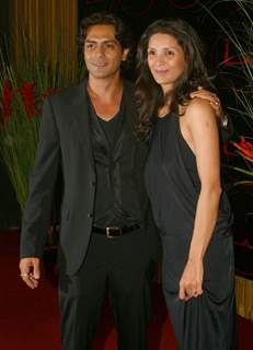 Bollywood actor Arjun Rampal with wife at the red carpet event at openig of Arjun Rampal and A D Singh''s &quot;LAP'''' restaurant, in New Delhi on Friday Night