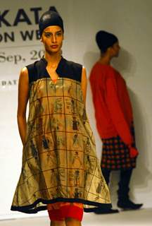 A models catwalks in an outfit design by Kalol Dutta during the Kolkata Fashion Week in Kolkata on 10th Sep 2009