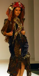 A model catwalks in an outfit design by Abhishek Vyas during the Kolkata Fashion Week in Kolkata on 10th Sep 2009