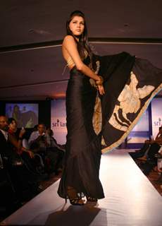 A Sri Lankan model presenting creation by Sri Lankan designer Darshi Keertisena during the Sri Lankan fashion show in New Delhi on 15 Sept Tuesday night 2009