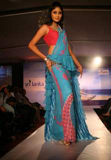 A Sri Lankan model presenting creation by Sri Lankan designer Darshi Keertisena during the Sri Lankan fashion show in New Delhi on 15 Sept Tuesday night 2009