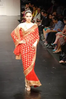 Mode walksl on the ramp of Anita Dongre''s timeless collection for spring/summer 2010 at Lakme Fashion Week was a stylish nostalgic fashion odyssey