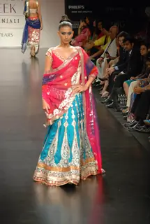 Mode walksl on the ramp of Anita Dongre''s timeless collection for spring/summer 2010 at Lakme Fashion Week was a stylish nostalgic fashion odyssey