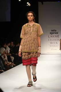 A model walks the runway at the Neha Aggarwal show at Lakme Fashion Week Spring/Summer 2010