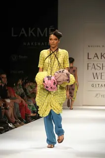 A model walks the runway at the Kallol Datta show at the Lakme Fashion Week Spring/Summer 2010 Day 5, in Mumbai