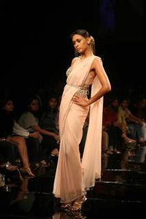 A model walks the runway at Rakesh Aggarwal show at the Lakme Fashion Week Spring/Summer 2010 Day 5, in Mumbai