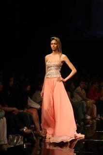 A model walks the runway at Rakesh Aggarwal show at the Lakme Fashion Week Spring/Summer 2010 Day 5, in Mumbai