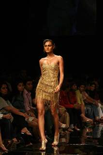 A model walks the runway at Rakesh Aggarwal show at the Lakme Fashion Week Spring/Summer 2010 Day 5, in Mumbai