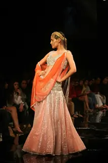 A model walks the runway at Rakesh Aggarwal show at the Lakme Fashion Week Spring/Summer 2010 Day 5, in Mumbai