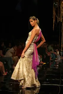 A model walks the runway at Rakesh Aggarwal show at the Lakme Fashion Week Spring/Summer 2010 Day 5, in Mumbai