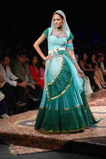 A model walks the runway at Tarun Tahiliani show at the Lakme Fashion Week Spring/Summer 2010 Day 5, in Mumbai