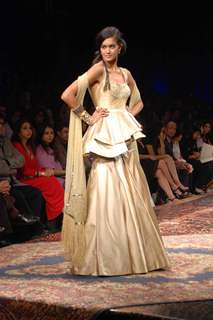 A model walks the runway at Tarun Tahiliani show at the Lakme Fashion Week Spring/Summer 2010 Day 5, in Mumbai