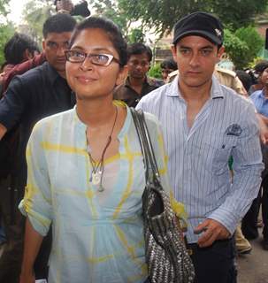 Aamir KHan & wife Kiran Rao pose after casting his votes today for Maharashtra Elections