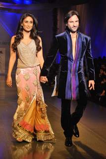 Bollywood''s star couple Kareena Kapoor and Saif Ali Khan walked the ramp in ensembles by designer Manish Malhotra at the HDIL India Couture Week in Mumbai Wednesday night