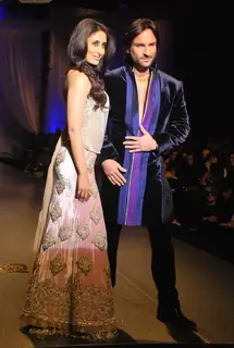 Bollywood''s star couple Kareena Kapoor and Saif Ali Khan walked the ramp in ensembles by designer Manish Malhotra at the HDIL India Couture Week in Mumbai Wednesday night
