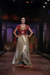 A model showcasing designer Varun Bahl''s creation on the ramp at the HDIL India Couture Week in Mumbai Wednesday night
