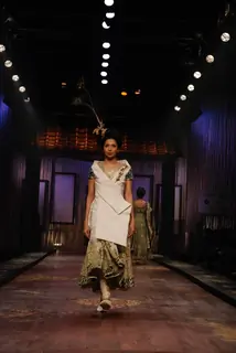 A model showcasing designer Varun Bahl''s creation on the ramp at the HDIL India Couture Week in Mumbai Wednesday night