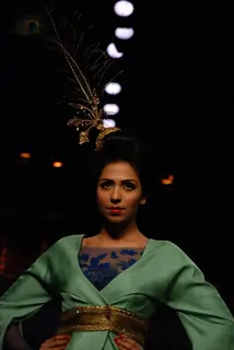 A model showcasing designer Varun Bahl''s creation on the ramp at the HDIL India Couture Week in Mumbai Wednesday night