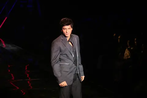 Shah Rukh Khan walks on the ramp for the Karan Johar show