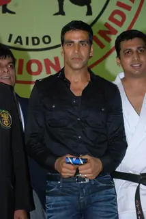 Bollywood Actor Akshay Kumar addresses during 1st Invitational Open National Karate Championship at Andheri Sports Complex, Mumbai on Wednesday, 21 October 2009