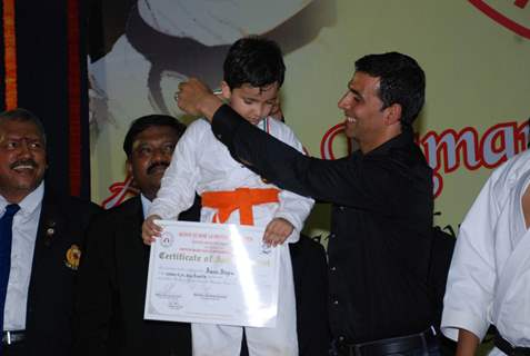 Bollywood Actor Akshay Kumar addresses during 1st Invitational Open National Karate Championship at Andheri Sports Complex, Mumbai on Wednesday, 21 October 2009