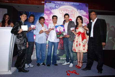 Bollywood Actor Aftab Shivdasani and Aamna Sharif pose for the photographers during the music release of forthcoming film ''Aao Wish Karein'' in Mumbai on Friday, 23 October 2009