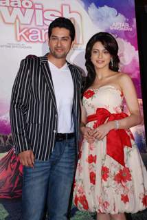 Bollywood Actor Aftab Shivdasani and Aamna Sharif pose for the photographers during the music release of forthcoming film ''Aao Wish Karein'' in Mumbai on Friday, 23 October 2009