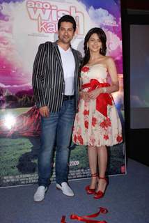 Bollywood Actor Aftab Shivdasani and Aamna Sharif pose for the photographers during the music release of forthcoming film ''Aao Wish Karein'' in Mumbai on Friday, 23 October 2009