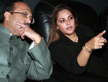 Jaya Prada watching her Bengali film Sesh Sanghat with Amar Singh in Kolkata on Thursday