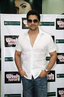 Bollywood Actor Aftab Shivdasani poses for the photographers during the celebration of Nakshatra''s brand success in Mumbai on Monday, 16 November 2009