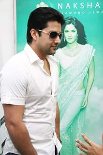 Bollywood Actor Aftab Shivdasani poses for the photographers during the celebration of Nakshatra''s brand success in Mumbai on Monday, 16 November 2009