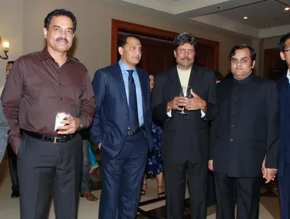 Cricketers Dilip Wengerksar, Mohammad Azharuddin and Kapil Dev at the bash of Videocon''s Aniruddh Dhoot