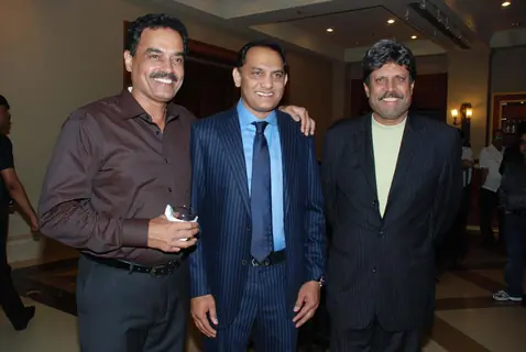Cricketers Dilip Wengerksar, Mohammad Azharuddin and Kapil Dev at the bash of Videocon''s Aniruddh Dhoot