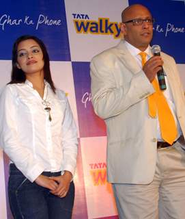 Tata Teleservice Sanjiv Sinha, Regional Head East & Chief Operating Officer, Tata Teleservices Limited Kolkata Circle at the unveiling of &quot;New Tata Walky Ghar Ka Phone &quot; actress Rimjhim Mitra also in the picture, in Kolkata on 30