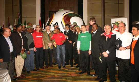 South African high commissioner Francis Moloi with the heads of missions of countries participating in the 2010 FIFA word cup at the signing the match ball, in New Delhi on Friday night (IANS: Photo)