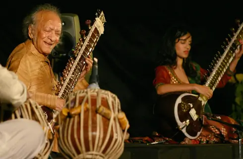 Sitar player Pt Ravi Shankar and his daughter Anoushka Shankar at the concert ''''Music in the Park'''', in New Delhi on Saturday (IANS: Photo)