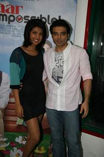 Bollywood actors Priyanka Chopra and Uday Chopra at the promotional event of &quot;Pyaar Impossible&quot; at Radio Mirchi studio