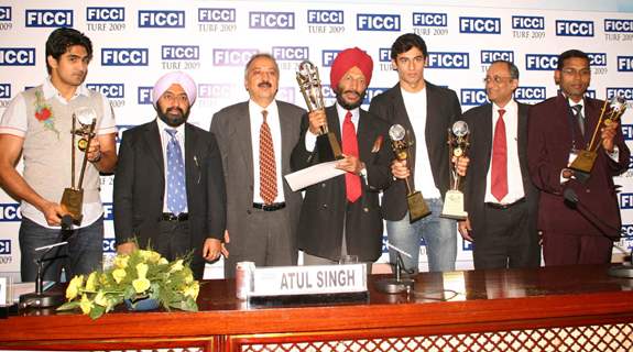 FICCI Sec Gen Dr Amit Mitra and Atul Singh with the awardees Vijender Singh, Milkha Singh, Virdhawal Khade and Prasant Karmarkar in New Delhi on Wednesday 16 Dec 2009