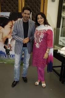Bollywood actor Gurdas Maan and Juhi Chawla, pose for the photographers during the press conference of film &quot;Sukhmani- Hope for Life&quot; in Mumbai on Thursday, 28 January 2010