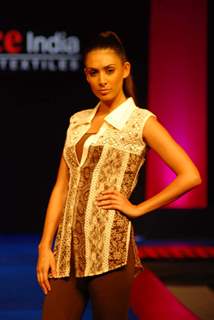 A model walks the ramp on the Day 2 of Source Fashion Show at Grand Hyatt in Mumbai