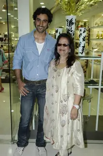 Bollywood actor Kunal Kapoor with a guest at the launch of &quot;Tresorie&quot; store in Oberoi Mall