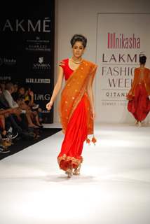 A model walk on the ramp for Nikasha Tawadey Show at Lakme Fashion Week 2010