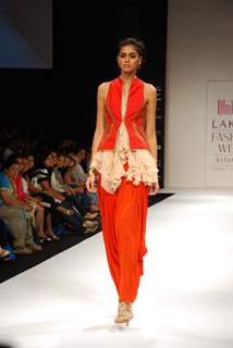 A model walk on the ramp for Nikasha Tawadey Show at Lakme Fashion Week 2010