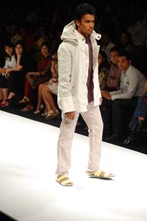 Model walks on the ramp for designer Amalaraj Sengupta at Lakme Fashion Week 2010