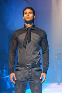 Model walks on the ramp for designer Narendra Kumar Ahmed at Lakme Fashion Week 2010