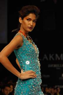 Model walks on the ramp for designer Swapnil Shinde at Lakme Fashion Week 2010