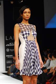 Model walks on the ramp for designer Christopher Kane at Lakme Fashion Week 2010