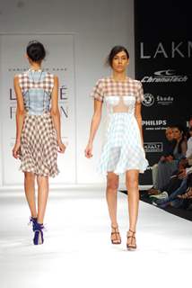 Models walk on the ramp for designer Christopher Kane at Lakme Fashion Week 2010