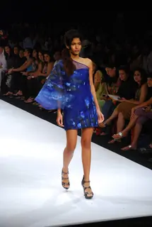 Model walks on the ramp for designer Walnut by nidhi & Divya Gambhir at Lakme Fashion Week 2010